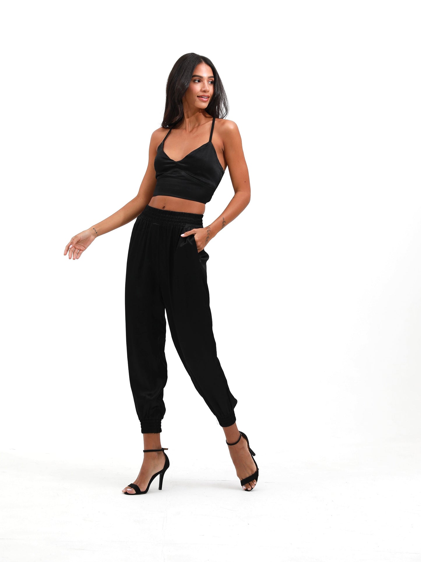 woman in black silk satin set