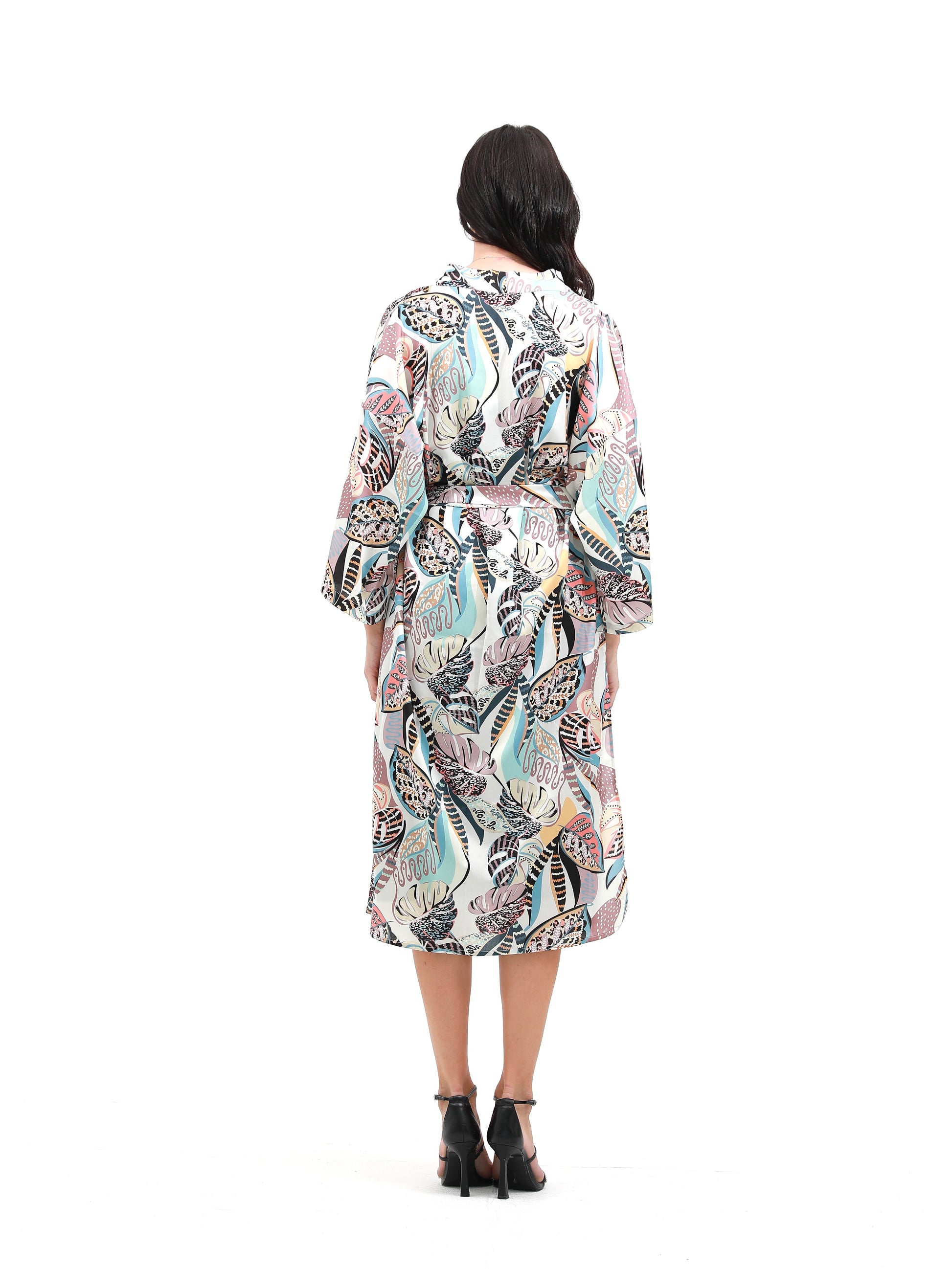 woman in summer kimono with tropical print light blue