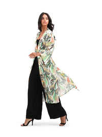 woman in summer kimono with tropical print palegreen