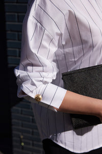 woman in cotton white |black striped shirt