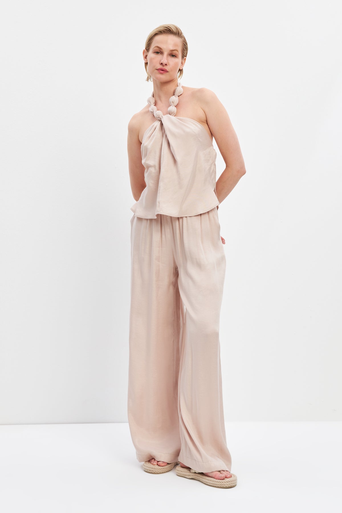 woman in Mia set flowy top and pants seashell risska