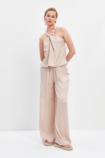 woman in Mia set flowy top and pants seashell risska