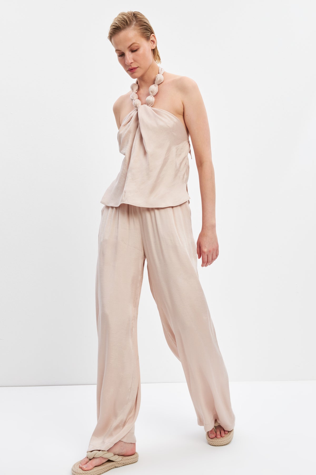 woman in Mia set flowy top and pants seashell risska