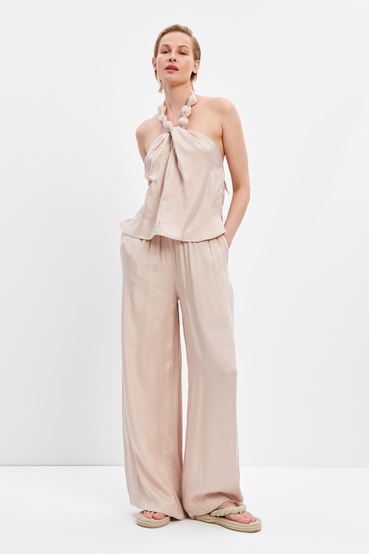 woman in Mia set flowy top and pants seashell risska