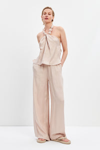 woman in Mia set flowy top and pants seashell risska