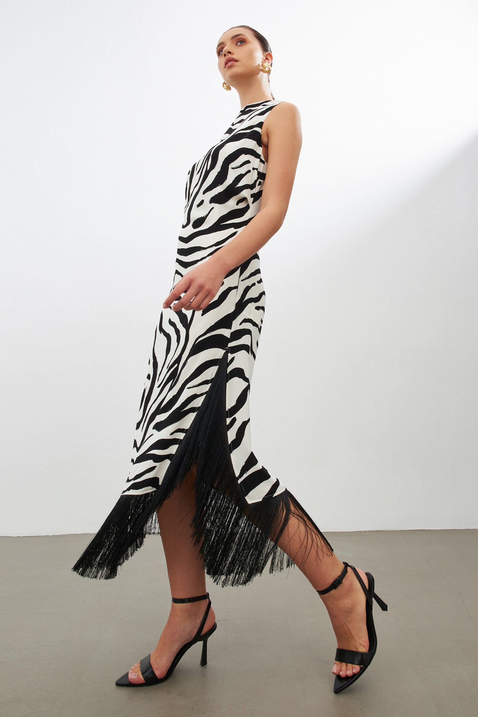 Black zebra print dress with side slit | fringe trim | risska