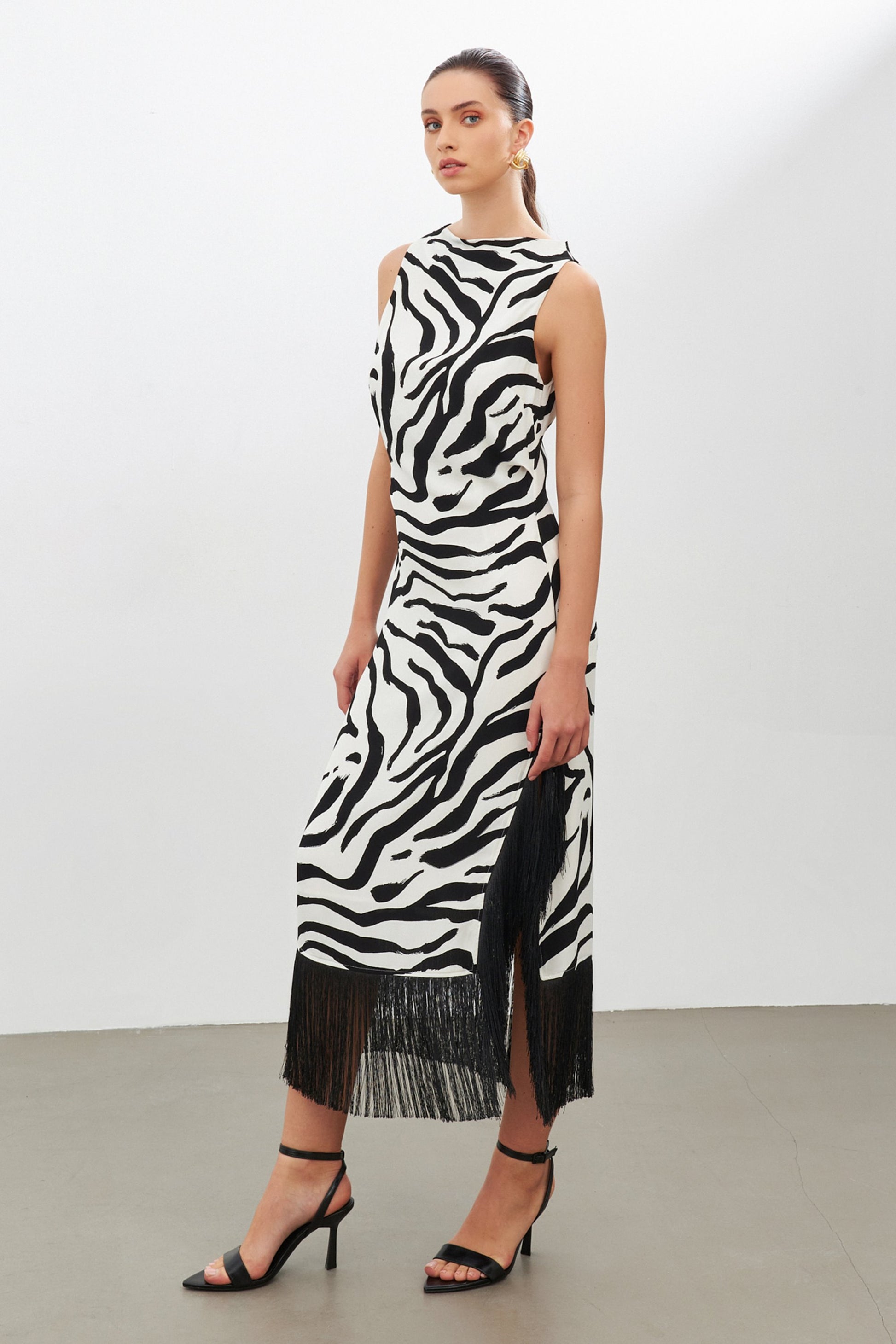 Black zebra print dress with side slit | fringe trim | risska