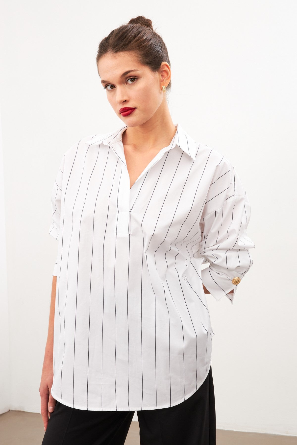 woman in cotton white |black striped shirt