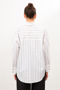 woman in cotton white |black striped shirt