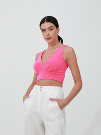 woman in pink crop top risska